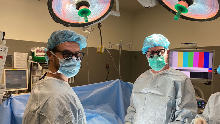 two male doctors in operating room
