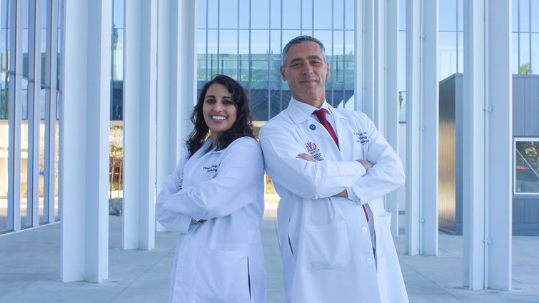 Care team members like cardio-oncologist Dr. Garg (left) and surgical oncologist Dr. Luca (right), partner to safeguard patients' health throughout heart and cancer treatments. From left: Vinisha Garg, MD, and Fabrizio Luca, MD.