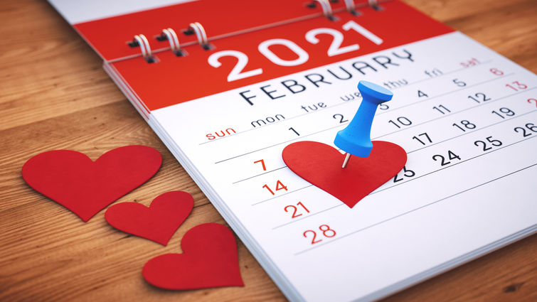 Calendar with heart pinned to it