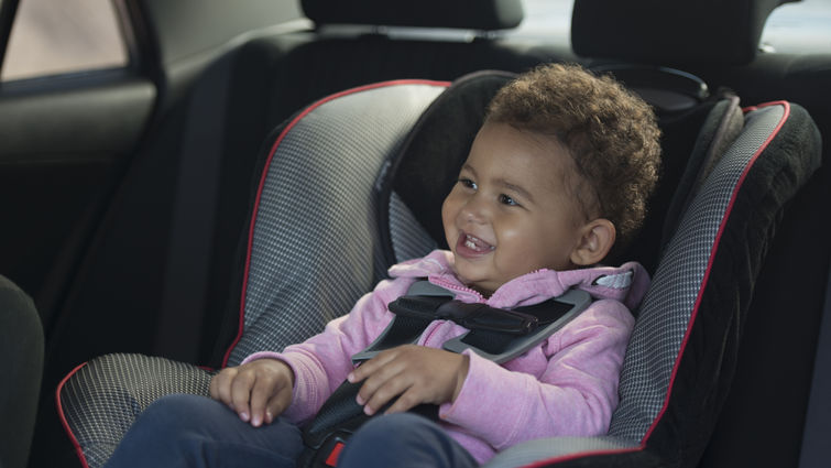 baby in car seat in car