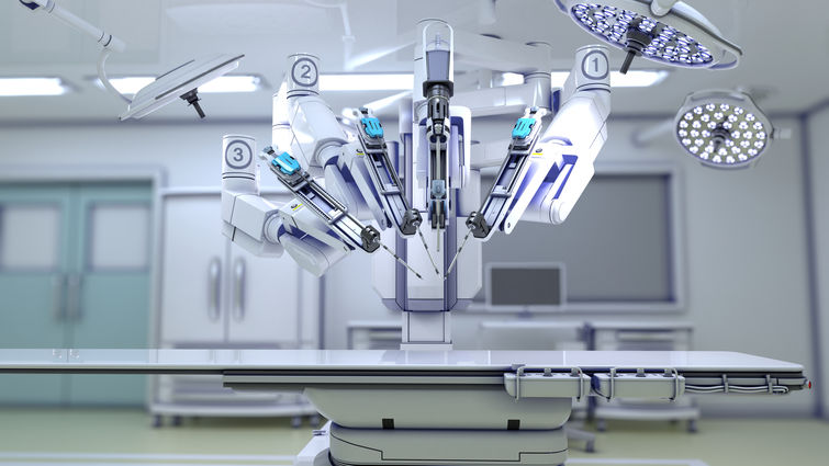 surgical robot in operating room above operating table