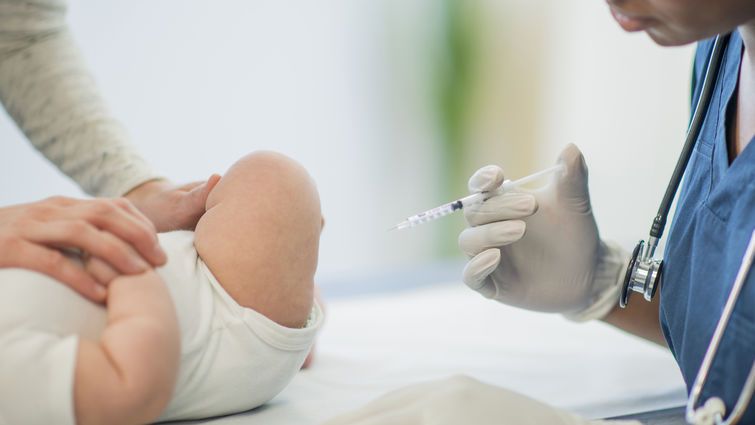 doctor vaccinating baby