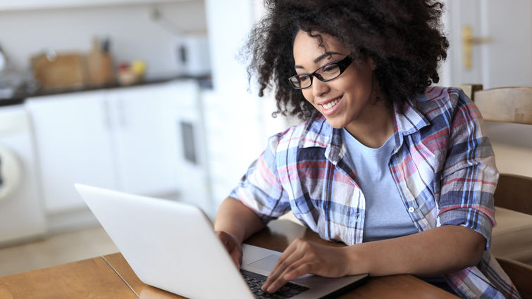 Young woman engaging in online learning