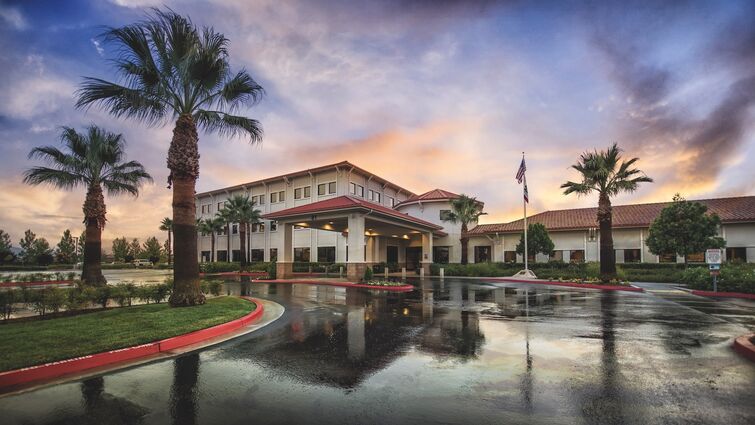 Medical clinic building at sunset