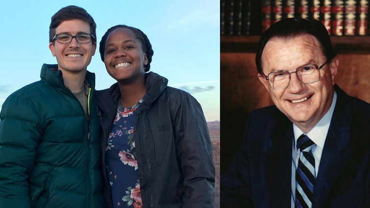 Husband and his wife at Grand Canyon next to portrait of male theologian