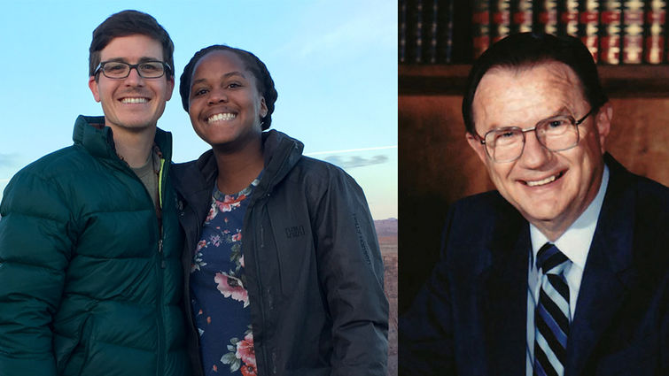 Husband and his wife at Grand Canyon next to portrait of male theologian