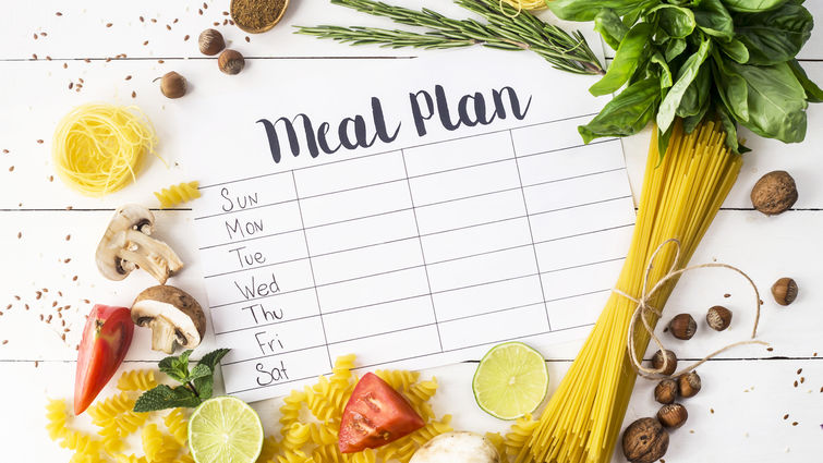 Pasta, vegetables, fruits and meal plan text.