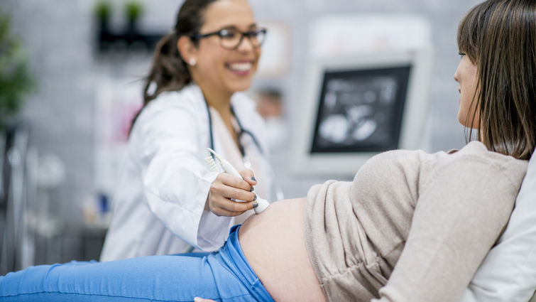 pregnant women gets ultrasound
