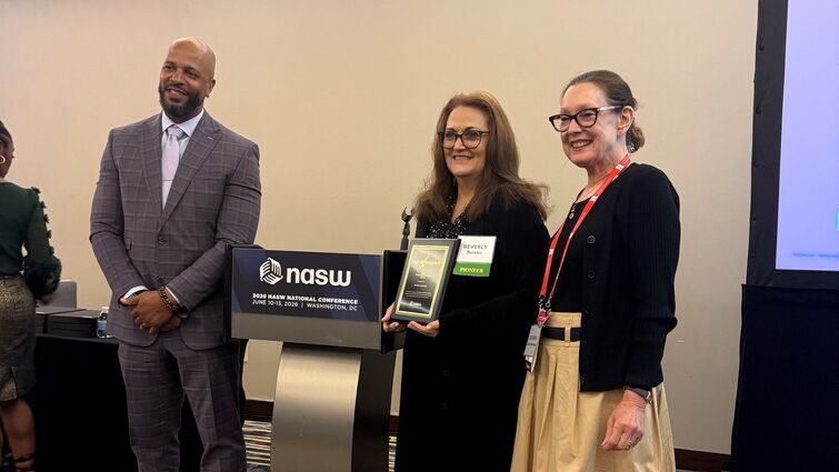 Dean Buckles with award
