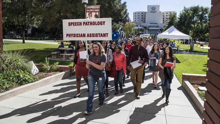 Students tour campus during Open House. University Open House