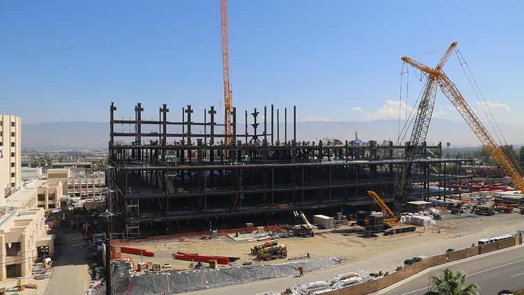 The first steel beams of the new Adult Hospital tower stand in place. LLUH under construction
