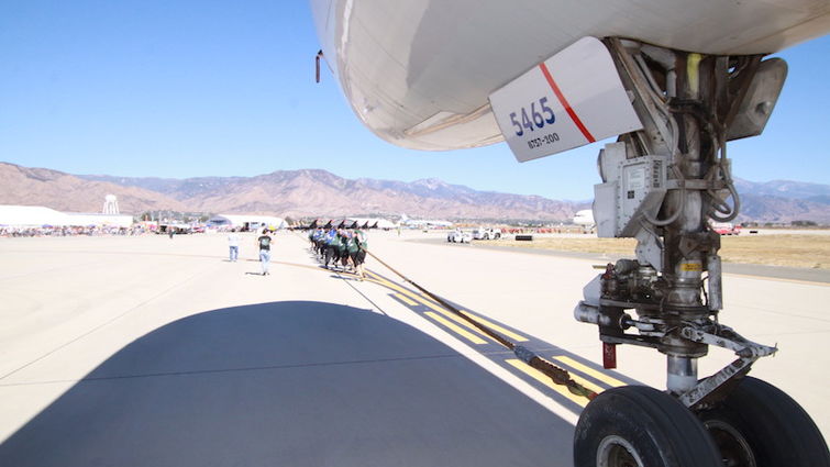 One of two teams pulling a 757 aircraft at the SBD Fest Plane Pull