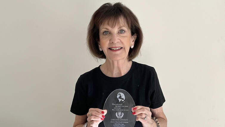 Robin Ungar with her duplicate award from School of Allied Health Professions.