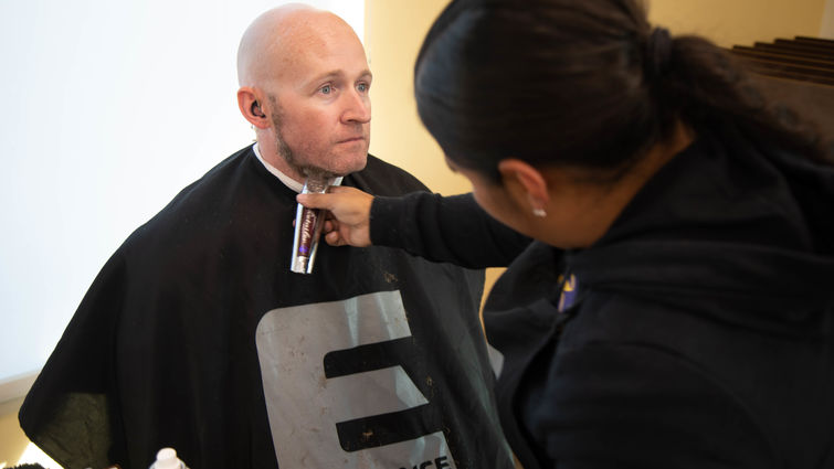 man getting beard shaved