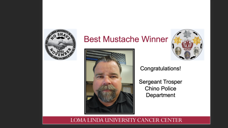 Slide announcing Sergeant Trosper of the Chino Police Department as Best Mustache Winner