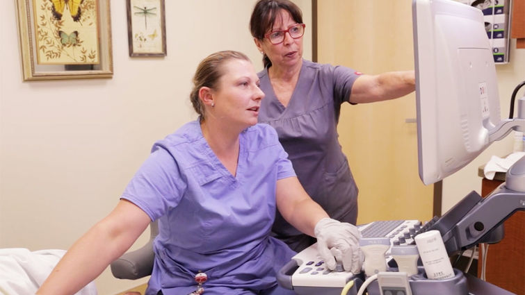 Marie DeLange, DMS, program director, instructs a diagnostic medical sonography student.