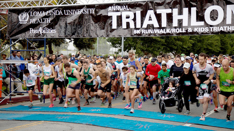 The second wave of participants in the 16th annual PossAbilities & Kid's Triathlon leaves the starting line on Sunday, April 29. Altogether, a total of 940 athletes competed in the event.