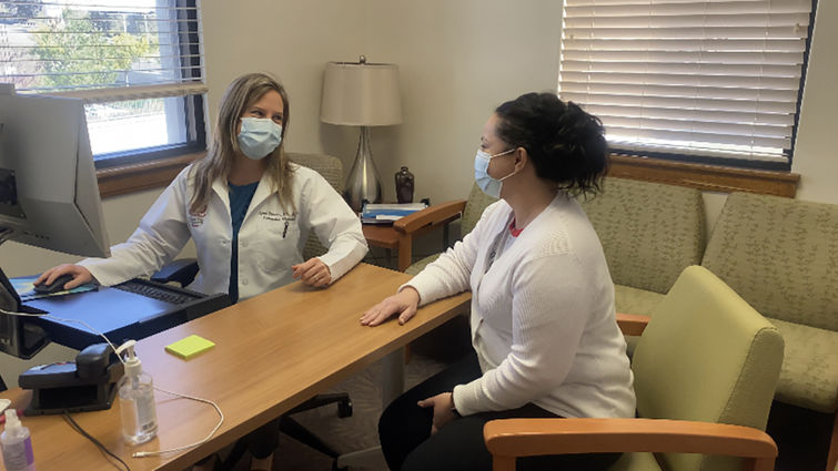 Dr. Wilson and patient Dr. Wilson and patient