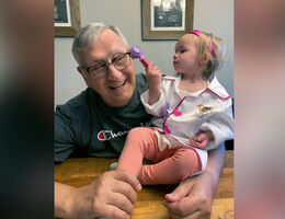 Ronald Blaum's granddaughter uses her medical toolkit to examine her grandfather, a pancreatic cancer survivor.