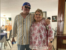 Jessica Guzman smiles alongside her brother.