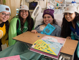 Women in hospital smiling for photo