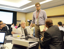 Peter Gleason, PhD, assistant professor at LLU School of Public Health, answers a question during the certificate in healthcare administration program. (Photo by Rafael Molina, MEd.) lluh