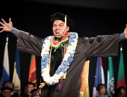 A graduate reflects the joyous mood of graduation day 2018 at Loma Linda University