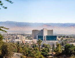 hilltop view of current and new hospital buildings