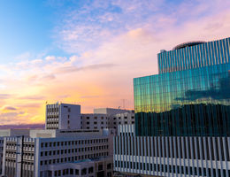 view of children's hospital with sun setting