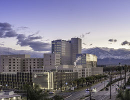 scenic photo of medical campus with mountains in background