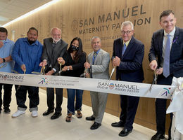 administrators and Tribe leaders cutting ceremony ribbon