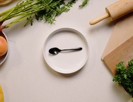 Photo of dish surrounded by vegetables