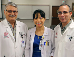 Left to right: Dr. Richard Catalano, Dr. Xian Luo, and Dr. Ahmed Abou-Zamzam smile