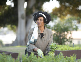 Woman gardens