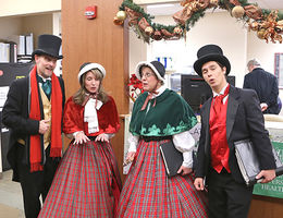 Desert Carolers John-David Wiese, Shannon Laux, Debora Biddick and Deryl Jon Blair performing “The Christmas Song” at Surgical Hospital Dec. 20.