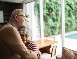 senior couple hugging