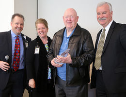 Don Bender (third from left) and Mark Hubbard (right) were honored for a combined total of 70 years of service to the safety coordinator program at Loma Linda University Health. Brett McPherson and Vicki Brown presented the awards.