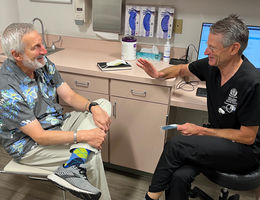 Dr. Ruckle consults with a patient in clinic