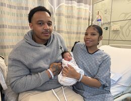 Parents Eric King and Alise Bailey hold their newborn, Carter King, who was born on New Year's Day at Loma Linda University Children's Hospital