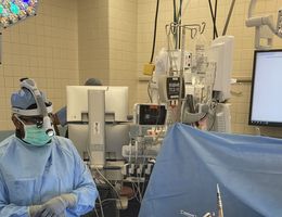 Dr. Hussain in the operating room about to perform a neuromodulation surgery