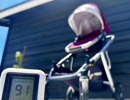 Stroller parked under the sun