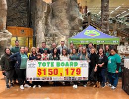 Representatives from LLUCH and KFROG Radio celebrated the final moments of the Kfroggers 4 Kids Radiothon on Thursday, Dec. 8, raising $150,179 and counting. Large group around total funds raised board
