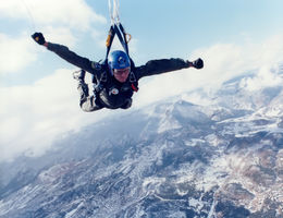 Daniel Eagle skydiving during his time as an Air Force officer.