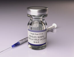 Measles, Mumps, Rubella virus vaccine vial and syringe