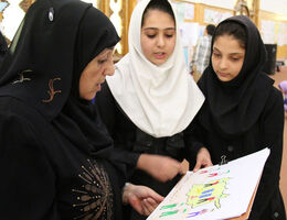 Sakena Yacoobi speaks with little girls