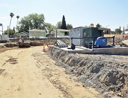 Grading the new access road that surrounds the Troesh Medical Campus.