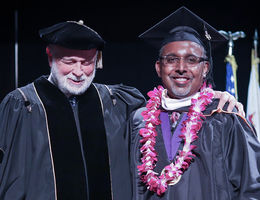 President Richard Hart and President’s Award winner Bates Moses during commencement June 10