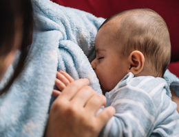 mom breastfeeding her baby