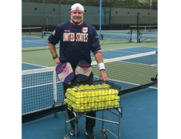 Greg Johnson poses on pickleball court