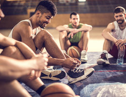 Young men taking a break from basketball